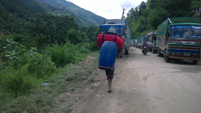 Arniko Highway landslide, truckx waiting, Porter with our gear