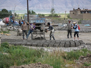Making bricks to make buildings