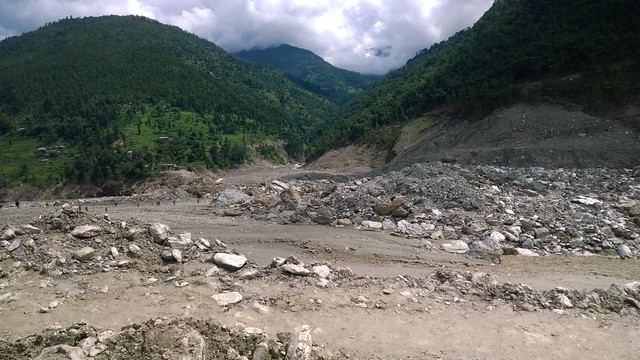 Arniko Highway landslide, porters in distance